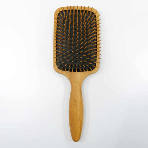 Henna color lab bamboo wood pin paddle brush. Straight on image to show overall length.