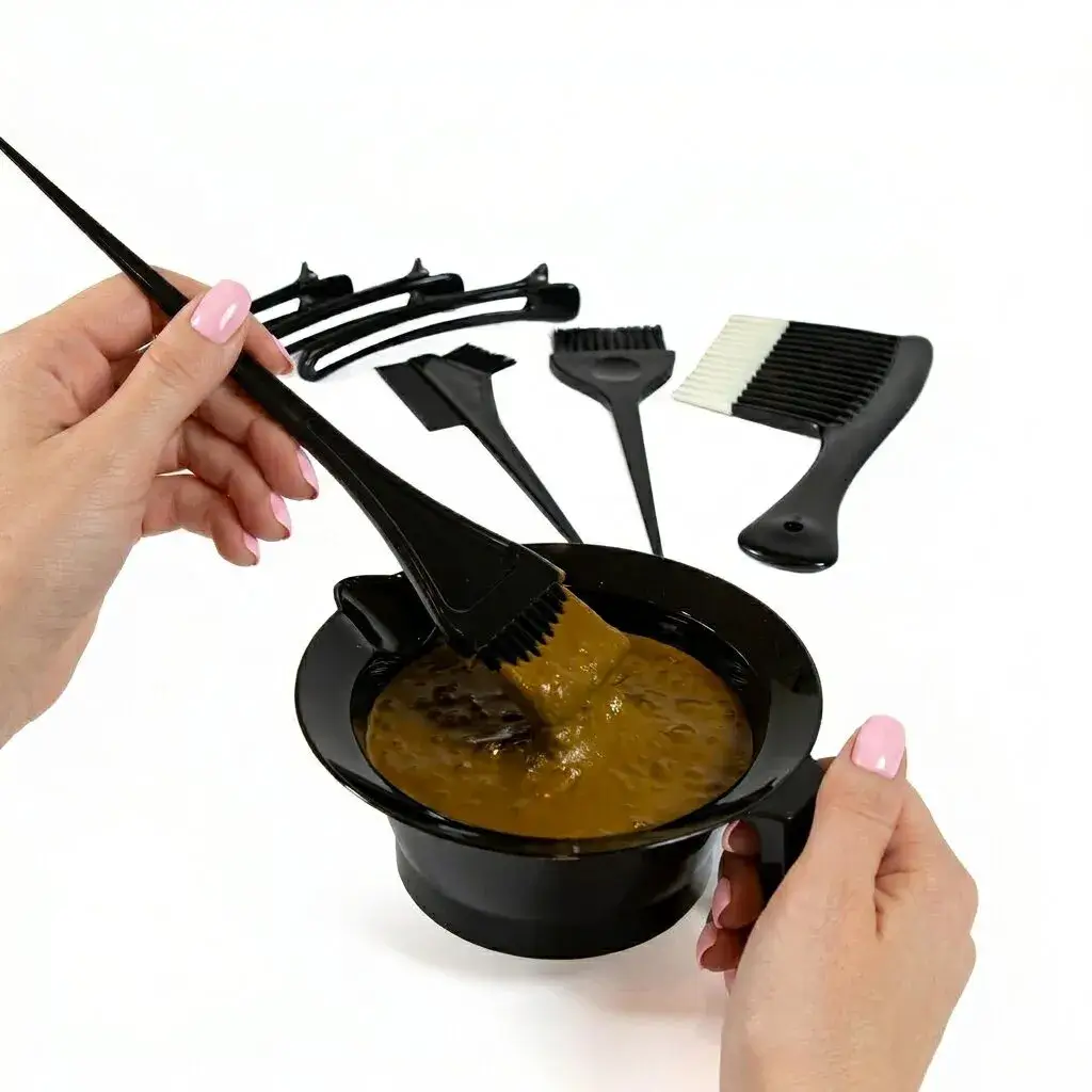 Hand displaying the use of the application bowl in the 8 piece tool kit.