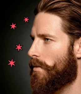 Man with manicured beard in profile.