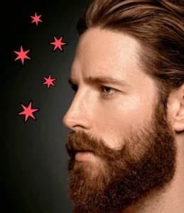 Man with manicured beard in profile.