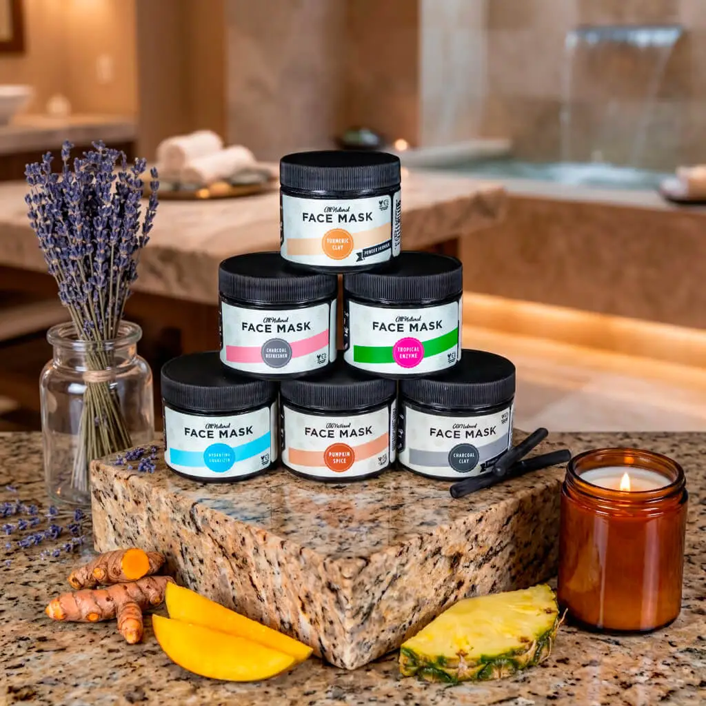 Stack of henna color lab face mask product line in pleasing spa setting.